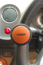Load image into Gallery viewer, I-Pop Steering Knob Black and Tan | Customized Steering Knob | Car Steering Knob | Best Steering Wheel Knob | I Pop Steering Knob.

